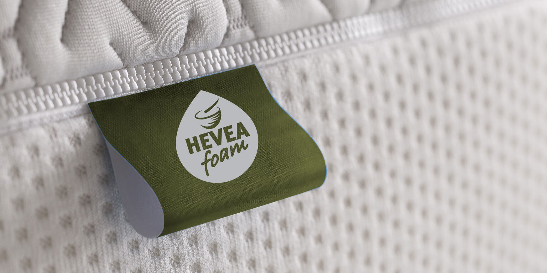 hevea-etiket-close-up-breed